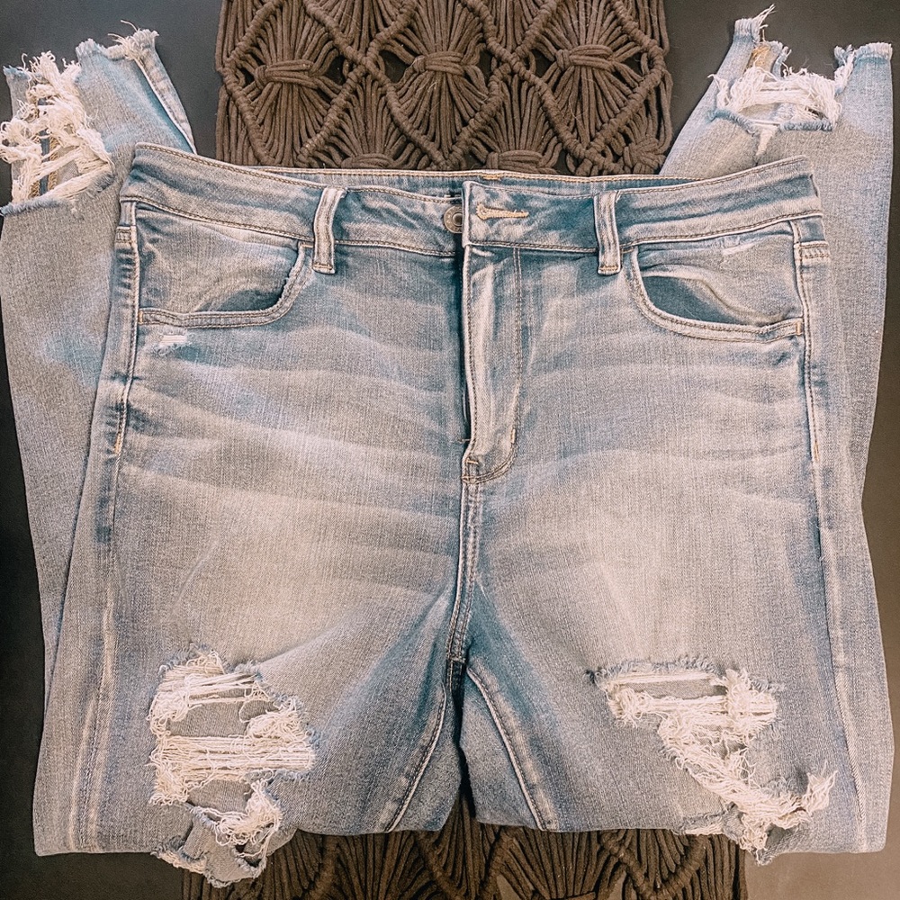 AE heavily distressed jeans light wash